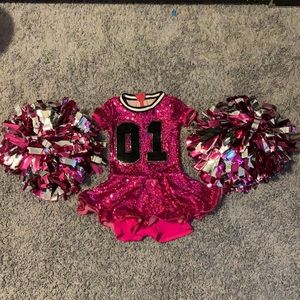 Weissman pink sequin cheerleader costume and pom poms